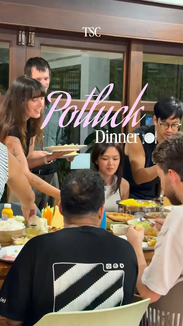 Members sharing a potluck dinner at The Social Club