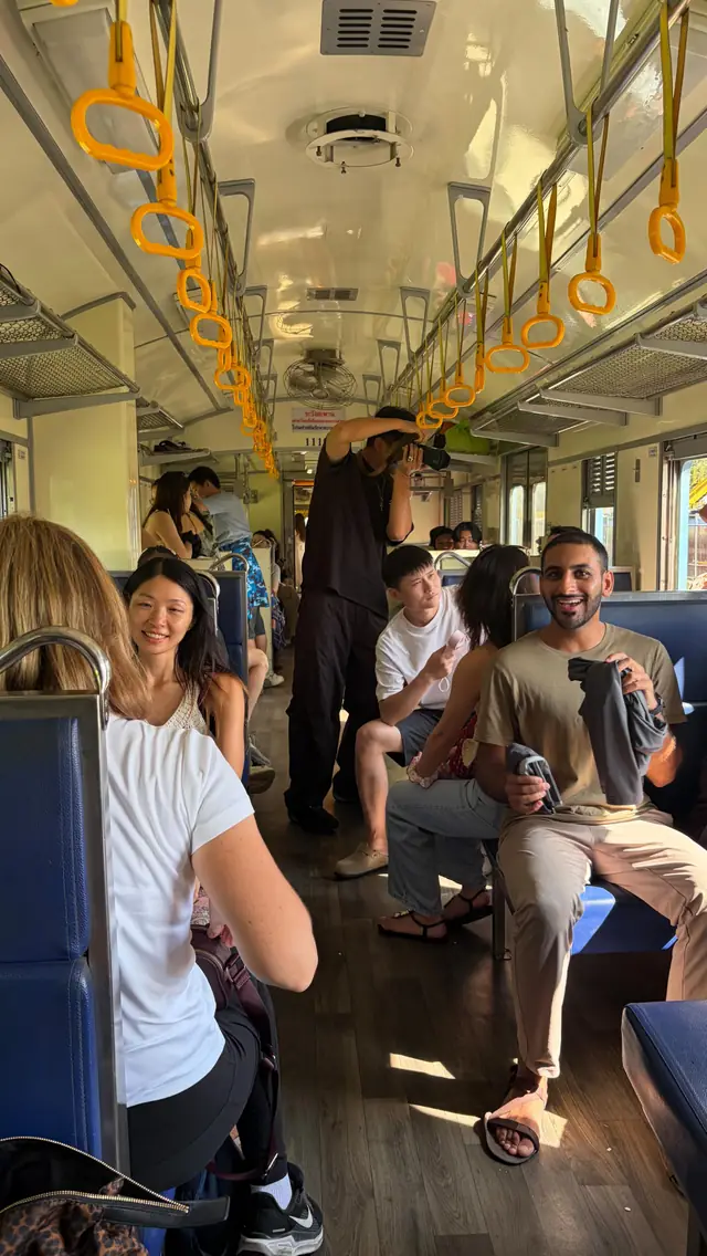 Members riding the train to Lamphun