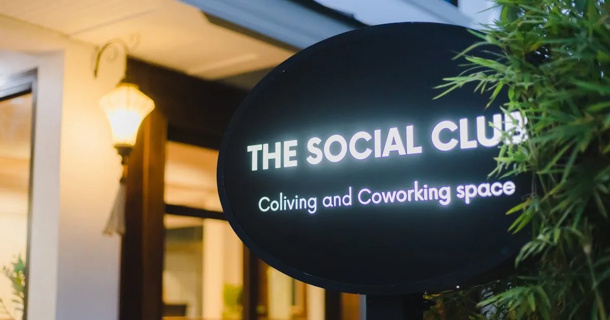 The Social Club - Coliving & Coworking sign at the entrance