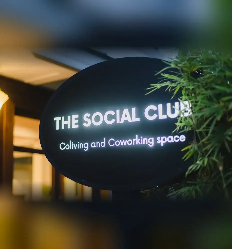 The Social Club coliving and coworking sign at the entrance