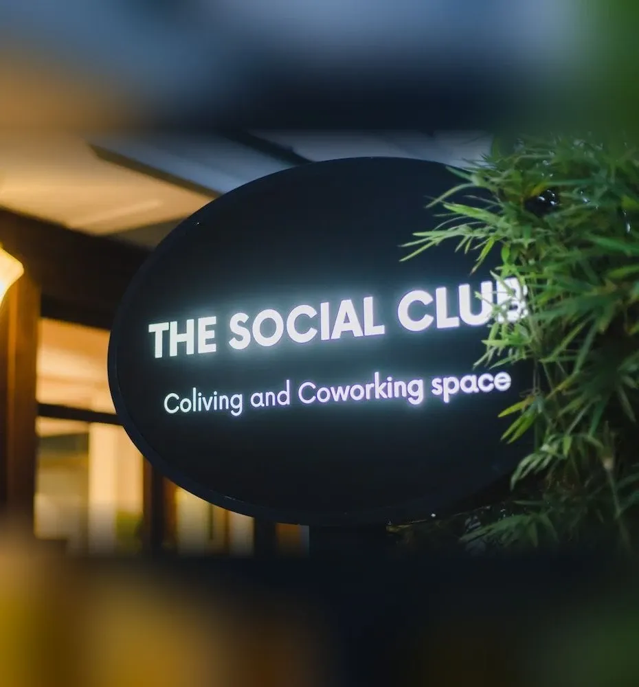 The Social Club coliving and coworking sign at the entrance