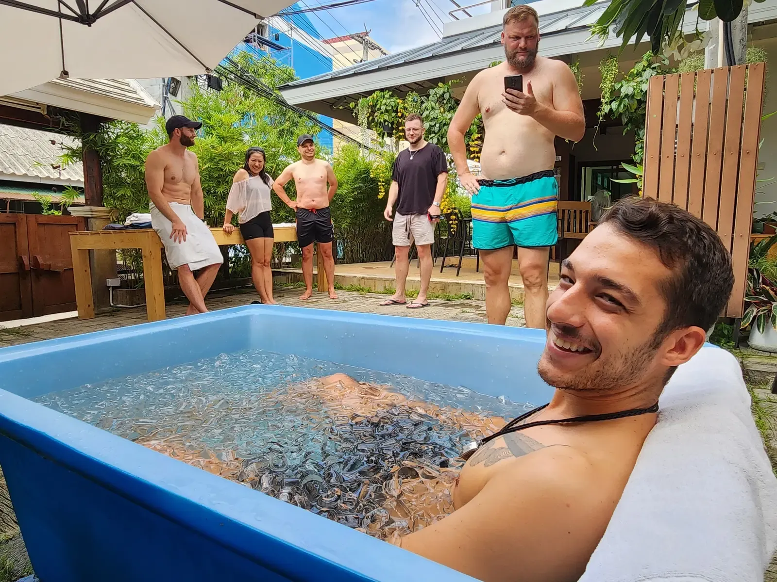 Member relaxing in the ice bath in the garden