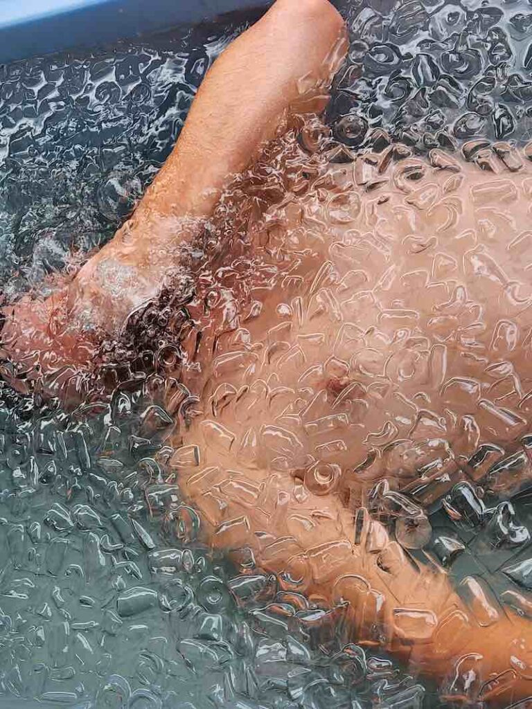 Coliving member diving in ice bath